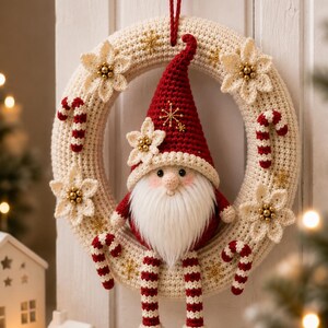 May include: A cream-colored crocheted wreath decorated with small white flowers featuring gold centers, red and white striped candy canes, and gold star accents. A gnome with a red hat and long white beard sits in the center of the wreath.