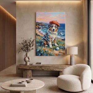May include: An oil painting on canvas depicting an Australian Shepherd dog wearing a red beret, holding a golf club in its mouth, and sitting on a grassy cliffside overlooking the ocean with a golf ball resting on the ground nearby.