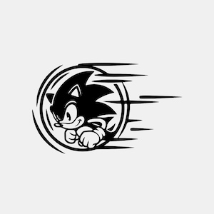 May include: A black and white graphic decal featuring a stylised illustration of the character Sonic the Hedgehog in a running pose. The design is enclosed within a circular frame with horizontal motion lines extending to the right side.