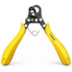 May include: A pair of black metal wire cutters with bright yellow handles. The tool features a spring mechanism between the handles and the text 1.5mm printed in black on the right handle. The cutting head has a circular opening for wire.
