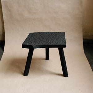 Wabi-Sabi three-legged burnt oak stool