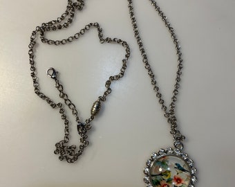 Bird pendant and chain necklace