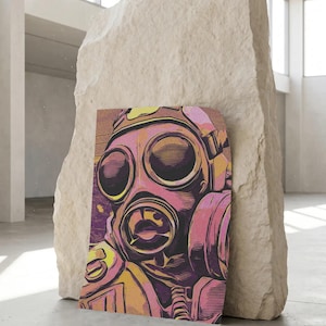 May include: A rectangular print featuring a stylised graphic illustration of a gas mask. The artwork utilises a vibrant colour palette of pink, purple, and yellow tones with heavy black line work, creating a high-contrast, comic-book aesthetic.