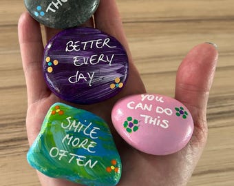 Hand-painted stones with heartfelt words to inspire, encourage, and brighten your day.