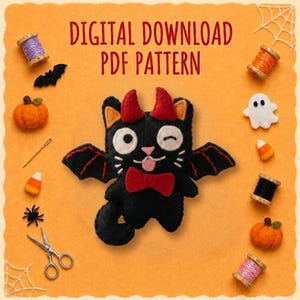 May include: A digital download PDF pattern featuring a felt black cat plush with red devil horns, bat wings, and a red bow tie. The cat has one winking eye and a pink tongue. Surrounding items include sewing spools, felt pumpkins, and a spider.