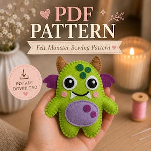 May include: A green felt monster sewing pattern PDF featuring a bright green creature with purple wings, a purple belly, brown horns, and large black and white eyes. The text reads PDF PATTERN, Felt Monster Sewing Pattern, and INSTANT DOWNLOAD.