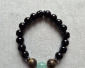 Black Beaded Stretch Bracelet – Mint Green & Brown Accent Beads