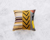 Throw pillow cover with a mix of 3 patches of fabric