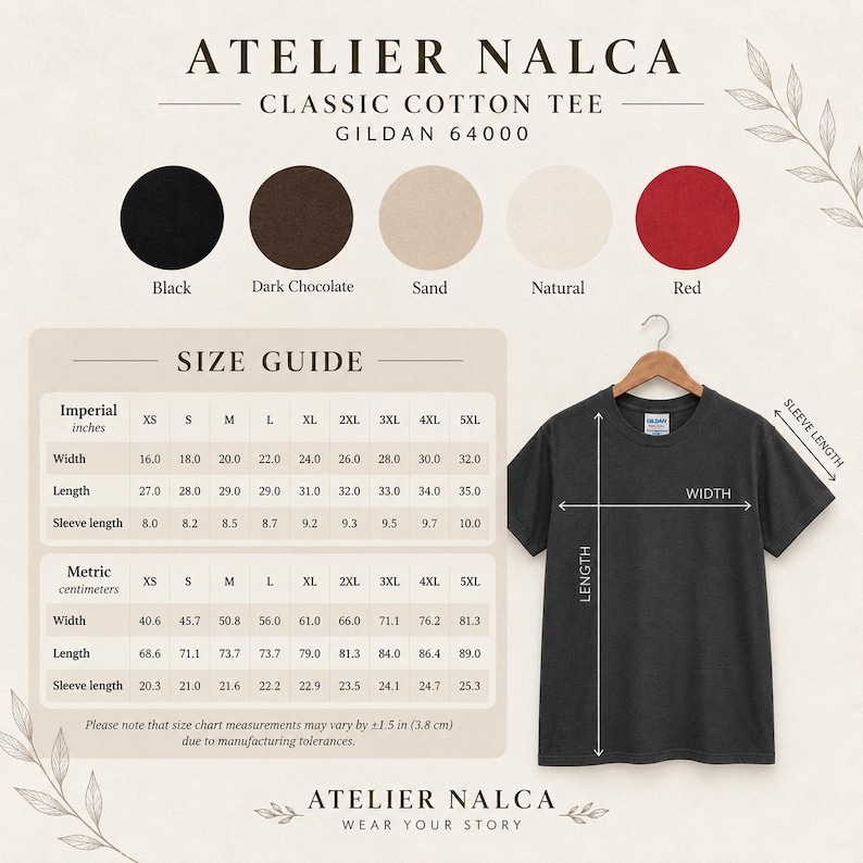 May include: A charcoal gray short-sleeve cotton t-shirt displayed on a wooden hanger. The image includes a size guide chart with imperial measurements in inches and a color palette showing black, dark chocolate, sand, natural, and red options.