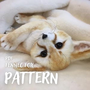 May include: A realistic plush fennec fox with large ears, dark eyes, and tan and white fur, lying on its side. The text PDF FENNEC FOX PATTERN is printed in white on the lower left side of the image, indicating a digital sewing or craft guide.