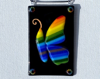 Rainbow Butterfly on Black Glass Ornament #1