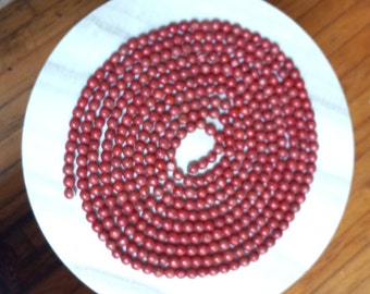 Vintage Farmhouse Wood Bead Garland, 9 ft., Cranberry Red
