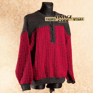 May include: A vintage red and gray sweater with a textured pattern. The sweater has a crew neck and long sleeves. The top portion and cuffs are gray, while the body is red with a dark gray woven design. The sweater has three buttons near the neckline. The text "VINTAGE CODE" is visible.