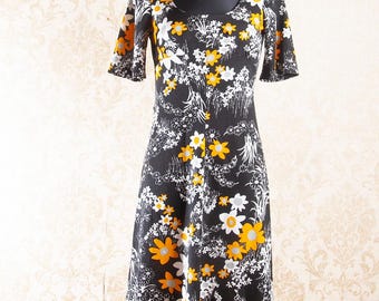 Vestido vintage floral de los años 70: estilo mod en negro, blanco y naranja (tallas S-M)