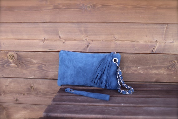 light blue suede clutch bag