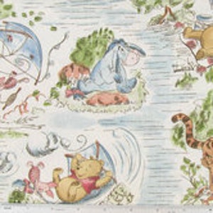May include: A white fabric featuring a repeating pattern of Winnie the Pooh and his friends from the Hundred Acre Wood. The characters are depicted in a cartoon style and are surrounded by blue water, green trees, and other woodland elements.