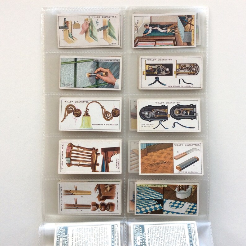 May include: A collection of vintage Wills Cigarettes trading cards, presented in a clear plastic holder. The cards display detailed illustrations and text, depicting various objects and scenes. The cards are in good condition, with vibrant colours and clear images.