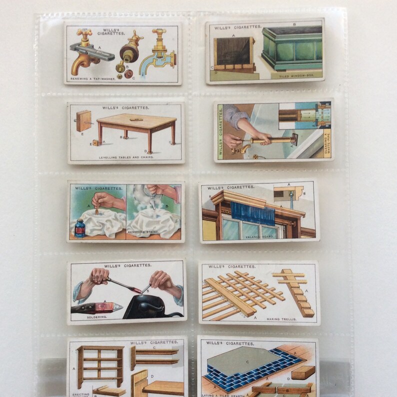 May include: A set of vintage Wills's Cigarettes cards, depicting illustrations of DIY and construction techniques. The cards are presented in a clear plastic holder, offering a glimpse into the past with detailed artwork.