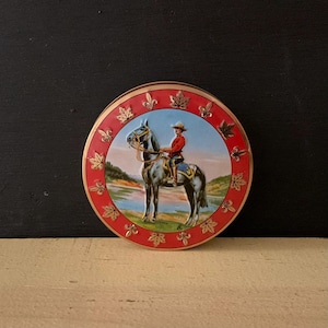 Vintage Ste La Vosgienne Assorted Bonbons Tin, Empty, Royal Mounted Police, Maple Leaves, Fleur de Lis