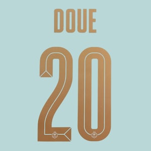 May include: A light blue sports jersey back featuring the name DOUE in gold lettering above the large gold number 20. The number 20 has a thin white outline and a small white emblem at the base of each digit, set against a solid light blue background.