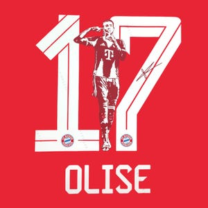 May include: A red graphic print featuring a large white number 17 with a silhouette of a soccer player in the center. The player wears a jersey with a T logo. The FC Bayern Munchen crest is visible on the number. The name OLISE is printed below.