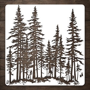 May include: A square stencil featuring a detailed silhouette of a dense forest with multiple tall pine trees of varying heights. The design is cut out from a white material, creating a negative space pattern of evergreen trees and ground foliage.