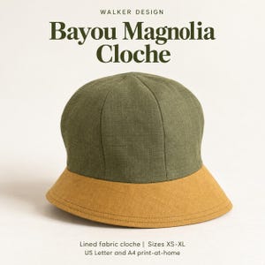 May include: A two-toned cloche hat featuring an olive green crown and a mustard yellow brim. The text reads: WALKER DESIGN Bayou Magnolia Cloche. Lined fabric cloche | Sizes XS-XL. US Letter and A4 print-at-home.