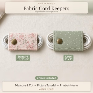 May include: Two fabric cord keepers with white cables wrapped inside. The left keeper has a pink floral pattern and is labeled Standard 1 1/2" x 5". The right keeper is sage green with white dots and is labeled Large 2" x 7". Text reads Walker Design Fabric Cord Keepers.