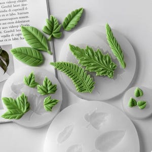 ALT 1: Leaf silicone mold with realistic leaf vein details for cake decorating, fondant, candles, aroma stones, and resin crafts.
ALT 2: Food-grade leaf silicone mold suitable for fondant, chocolate, handmade soaps, epoxy resin, Jesmonite, and DIY craft projects.
ALT 3: Reusable leaf mold for creating realistic botanical decorations, cake toppers, handmade candles, and aroma stones.