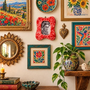 May include: A gallery wall featuring a landscape painting, a floral plate, a sunflower print, a red speckled frame with a portrait, a gold heart ornament, a sunburst mirror, a floral print, and a pothos plant in a speckled pot on a wooden shelf.