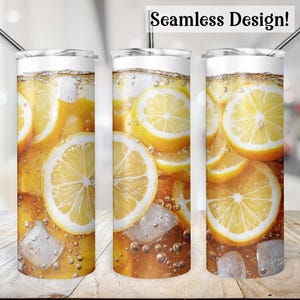 May include: A stainless steel tumbler with a seamless design featuring a pattern of yellow lemon slices and ice cubes in a clear liquid. The tumbler is perfect for iced tea or lemonade.