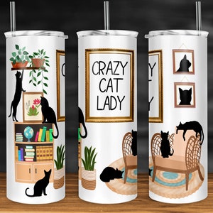 May include: Three white stainless steel tumblers with black cat illustrations and the text "Crazy Cat Lady". The tumblers have a straw and a lid.