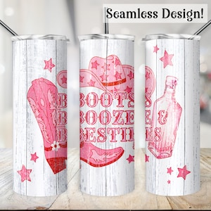 May include: Three white stainless steel tumblers with a pink and white woodgrain design. The tumblers feature a pink cowboy hat, boots, and a bottle with the text "Boots, Booze & Besties".
