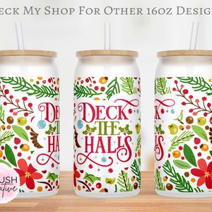 May include: Three white 16oz stainless steel tumblers with a wood lid and a clear straw. The tumblers feature a Christmas-themed design with red berries, green leaves, and the text "Deck the Halls".