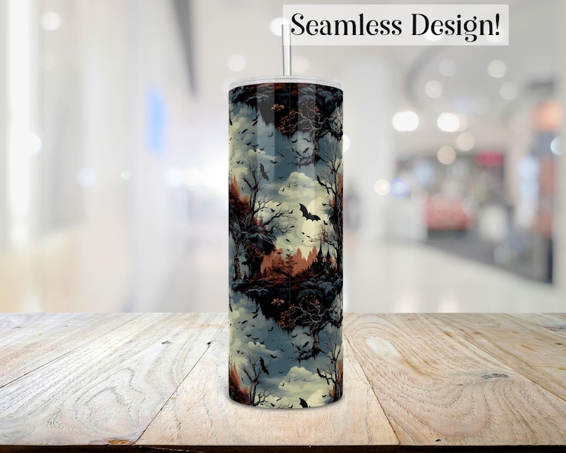 May include: A stainless steel tumbler with a seamless design featuring a dark forest scene with bats and trees. The background is a light blue and yellow color.