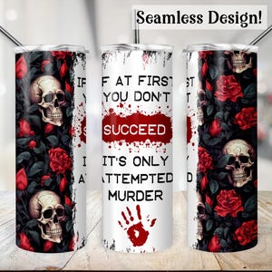 May include: A set of three stainless steel tumblers with black straws. The tumblers feature a design of skulls, red roses, and the text "IF AT FIRST YOU DON'T SUCCEED, IT'S ONLY AN ATTEMPTED MURDER".