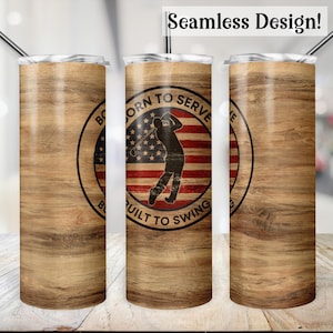 May include: A stainless steel tumbler with a wood grain design and a circular graphic that says "Born to Serve Built to Swing" with an American flag and a golfer silhouette.