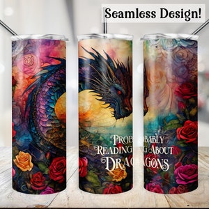 May include: A stainless steel tumbler with a colourful design featuring a dragon, roses, and the text "Probably Reading About Dragons".