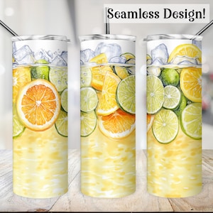 May include: A seamless design featuring a yellow and green citrus fruit pattern on a white tumbler. The design includes lemons, limes, and ice cubes. The tumbler is perfect for summer drinks.