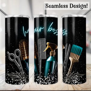 May include: A black and silver tumbler with a design of hairdressing tools, including scissors, combs, brushes, and a spray bottle. The text "hair boss" is written in blue neon lettering on the tumbler.