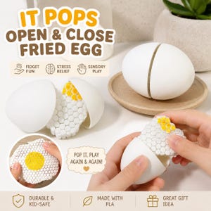 May include: A white egg-shaped fidget toy that opens to reveal a white and yellow honeycomb-textured interior. The text reads IT POPS OPEN & CLOSE FRIED EGG, FIDGET FUN, STRESS RELIEF, SENSORY PLAY, POP IT, PLAY AGAIN & AGAIN!, DURABLE & KID-SAFE, MADE WITH PLA, GREAT GIFT IDEA.