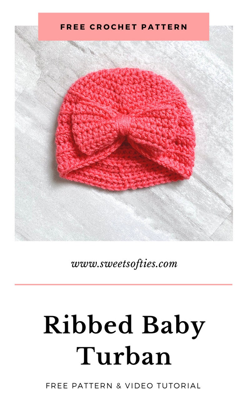 May include: A pink crocheted baby turban with a bow on top. The turban is on a white textured surface. The text "www.sweetsofties.com" is below the turban. The text "Ribbed Baby Turban" is below the website address. The text "FREE PATTERN & VIDEO TUTORIAL" is below the turban name.