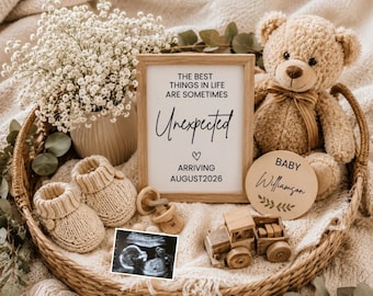 May include: A wicker basket containing a light wood frame with the text THE BEST THINGS IN LIFE ARE SOMETIMES Unexpected ARRIVING AUGUST 2026, a tan teddy bear, beige knit baby booties, a wooden toy truck, a baby announcement disc, and an ultrasound.