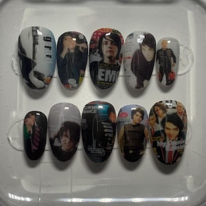 May include: A set of ten press-on nails featuring various photographic prints of the band My Chemical Romance. Each nail displays different band members, concert imagery, and text including the band name and the word Gerard in a glossy finish.