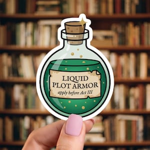 May include: A die-cut sticker shaped like a round glass bottle filled with green liquid. The bottle has a cork stopper and a tan label with the text LIQUID PLOT ARMOR and apply before Act III printed in black. Small gold sparkles float inside.