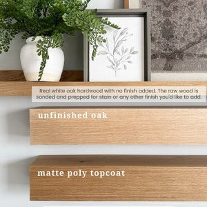 May include: Two wooden shelves, one unfinished oak and one with a matte poly topcoat. The text "unfinished oak" and "matte poly topcoat" is written on the shelves. The text below the shelves reads "Real white oak hardwood with no finish added. The raw wood is sanded and prepped for stain or any other finish you'd like to add. Enhances natural color of the wood & provides a protective finish for durability against wear & tear."