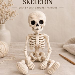May include: A crochet amigurumi skeleton with off-white yarn, black eye sockets, and a rib cage. The text reads SITTING AMIGURUMI SKELETON STEP-BY-STEP CROCHET PATTERN and PDF DIGITAL DOWNLOAD. A ball of yarn and a wooden crochet hook are visible.