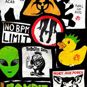May include: A collection of fabric patches featuring various graphic designs including a white cat with the text ACAB, a yellow biohazard symbol, a silhouette with the text PUNK'S NOT DEAD, a duck with a mohawk, an alien head, and a pig with the text MORT AUX PORCS.