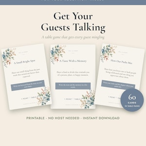 May include: A set of three rectangular wedding game cards with cream backgrounds, blue text, and watercolor eucalyptus leaf accents. The cards feature prompts like A Small Bright Spot, A Taste With a Memory, and How Our Paths Met. A blue circular badge indicates 60 cards and 10 table packs.