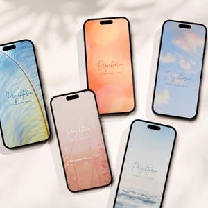 May include: Five smartphones with black frames arranged in a cluster, each displaying a unique digital wallpaper featuring the word Projektorin in cursive script, accompanied by varied background imagery including feathers, clouds, and soft gradients.